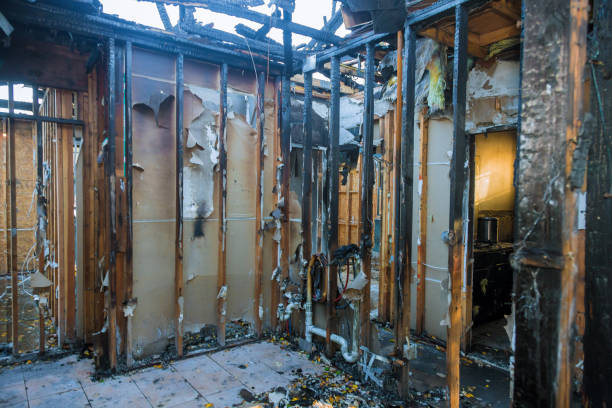 Professional Fire Damage Cleanup technician working in Masonic Home, KY
